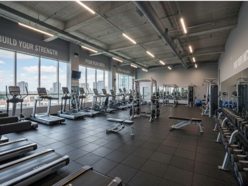 A close-up shot of rubber gym flooring texture showing SBR crumbs and EPDM flecks